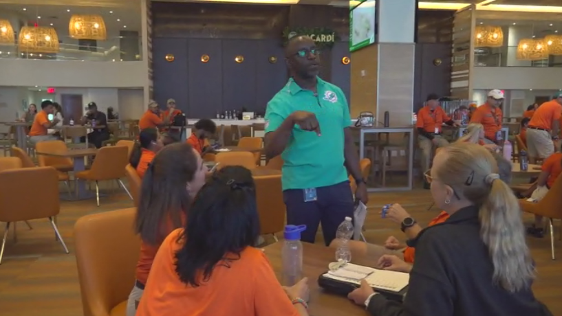 Miami Dade College professor finds his passion with side job at Hard Rock Stadium — CBS Miami, Mesquite Arts news
